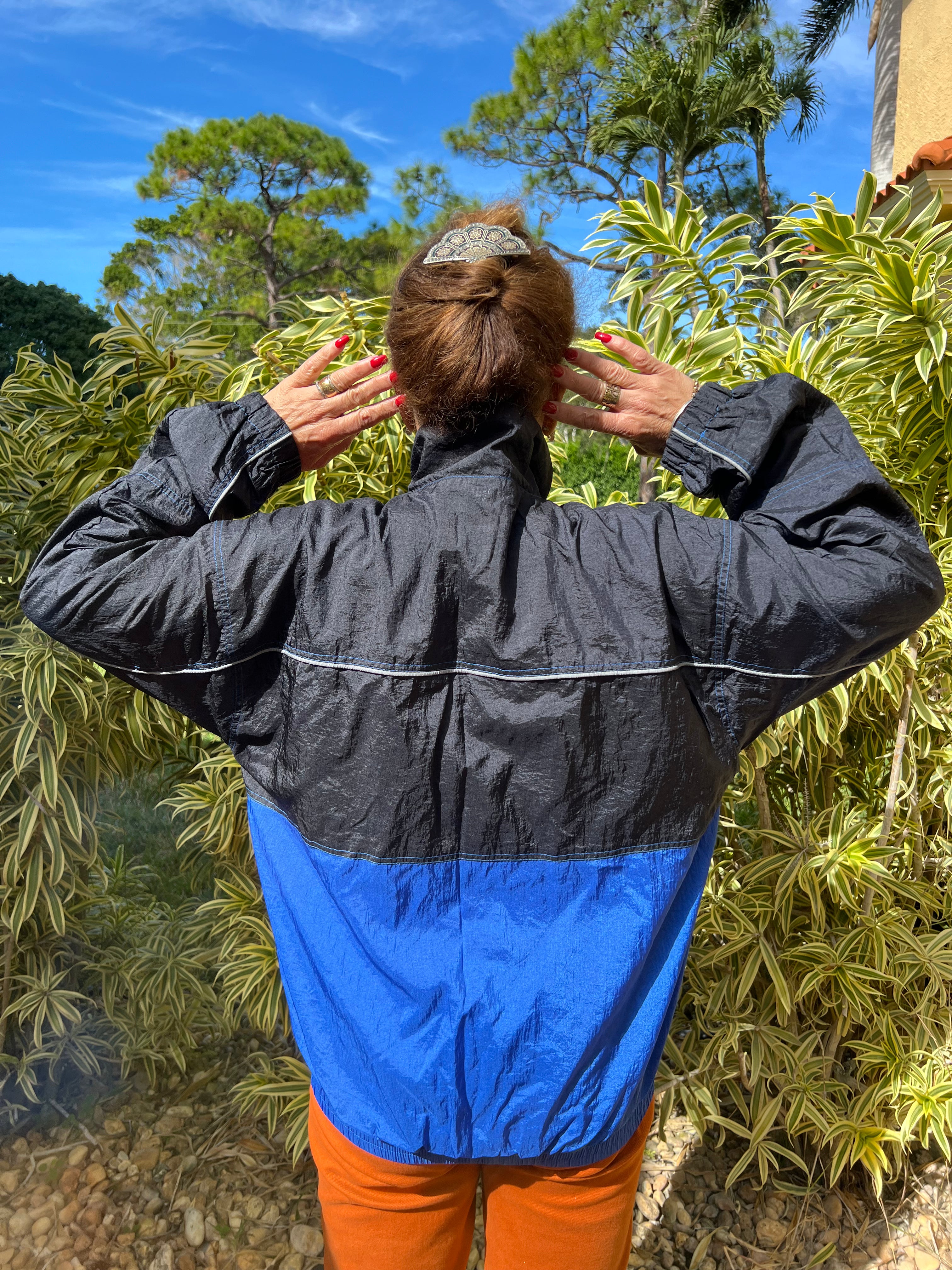 black and blue zip up trackie