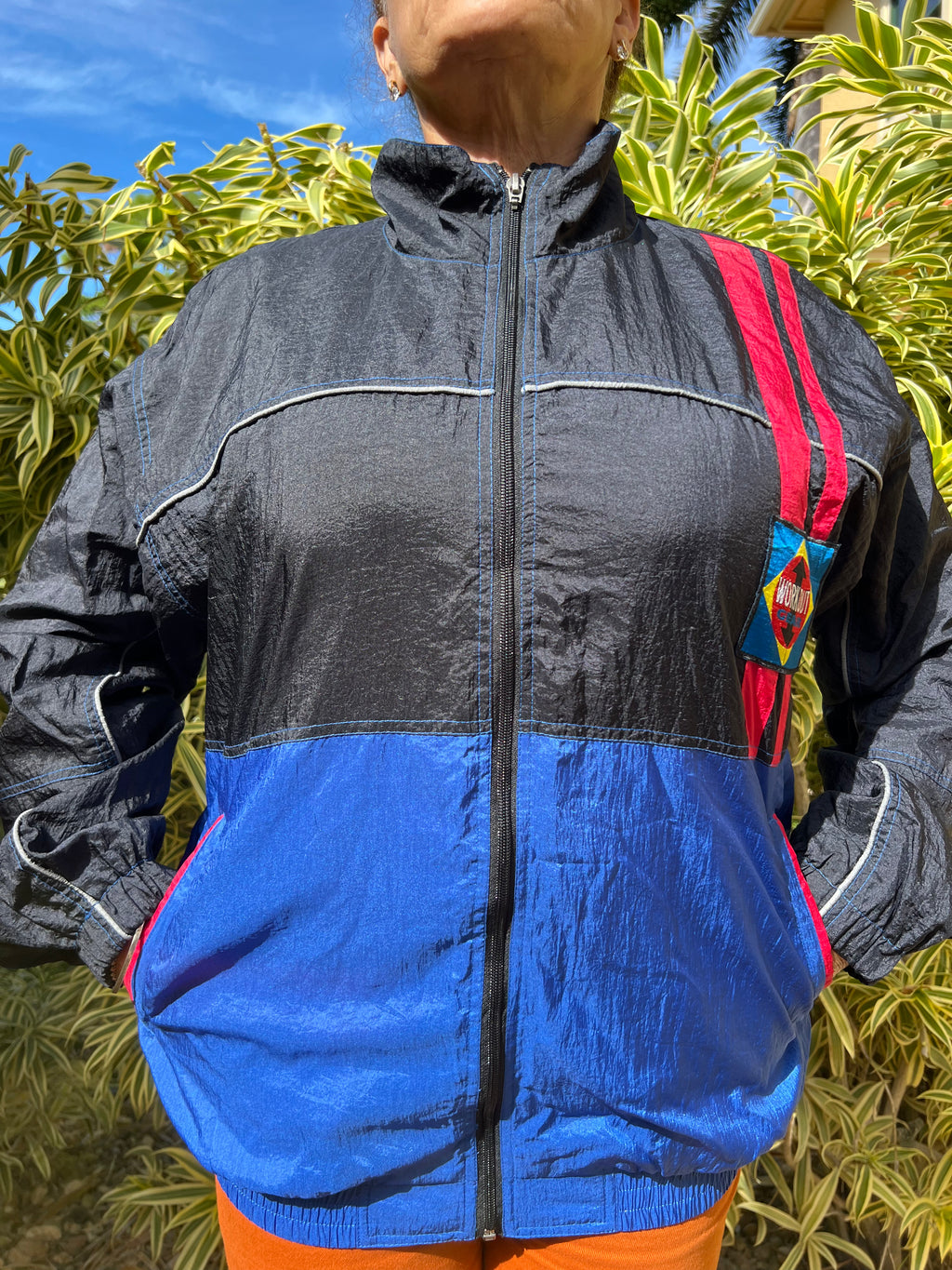 black and blue zip up trackie