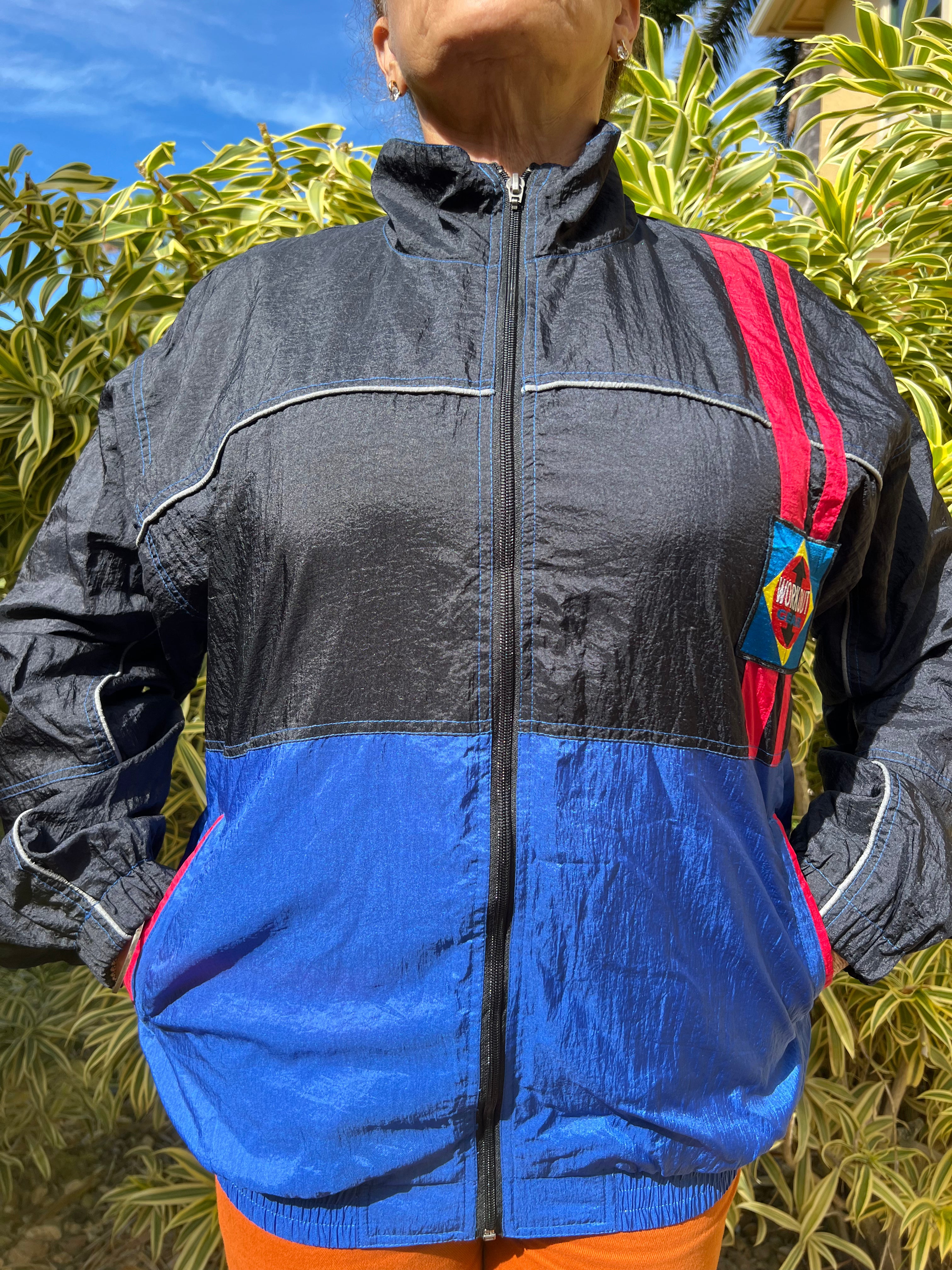 black and blue zip up trackie