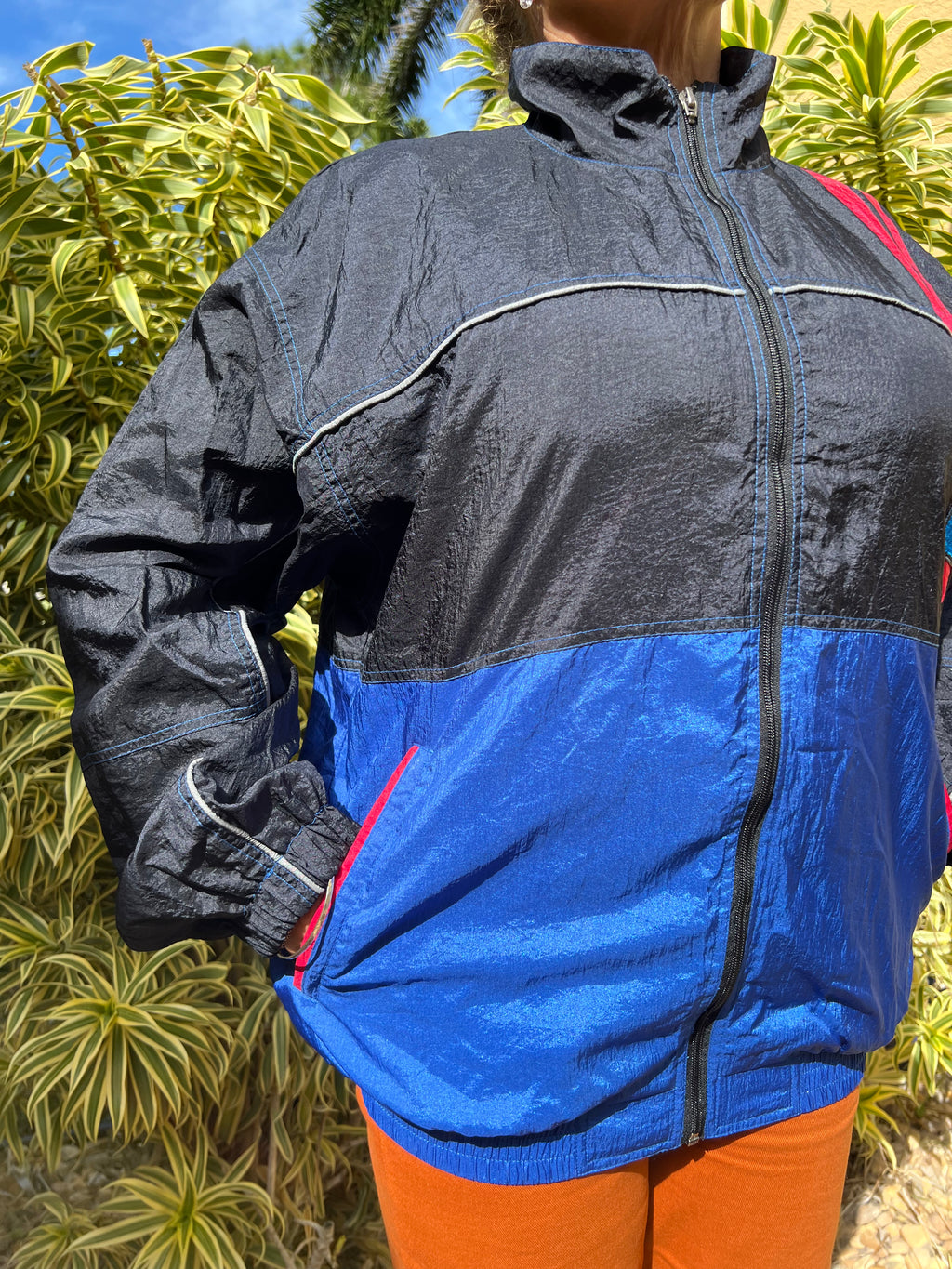 black and blue zip up trackie