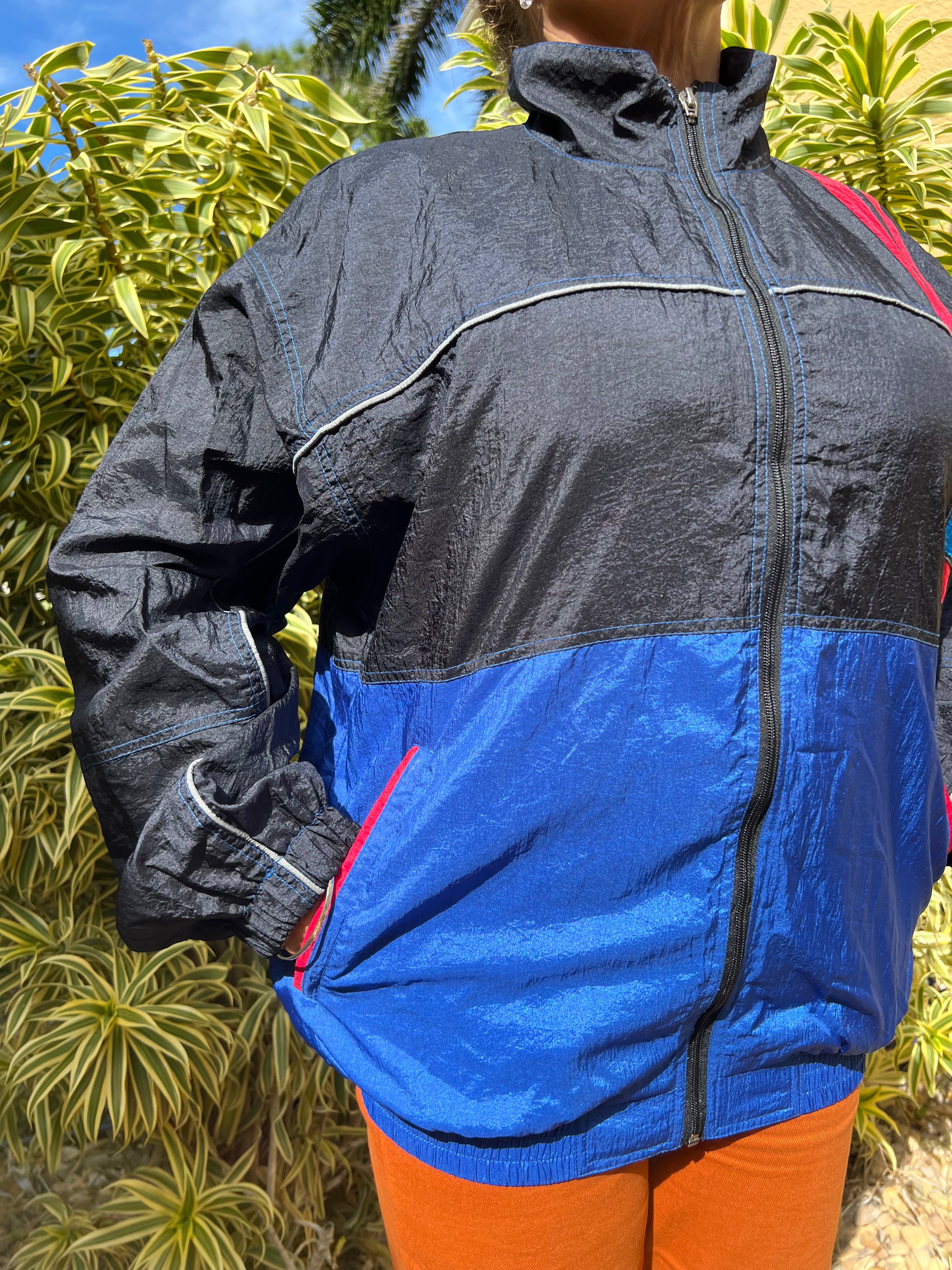 black and blue zip up trackie