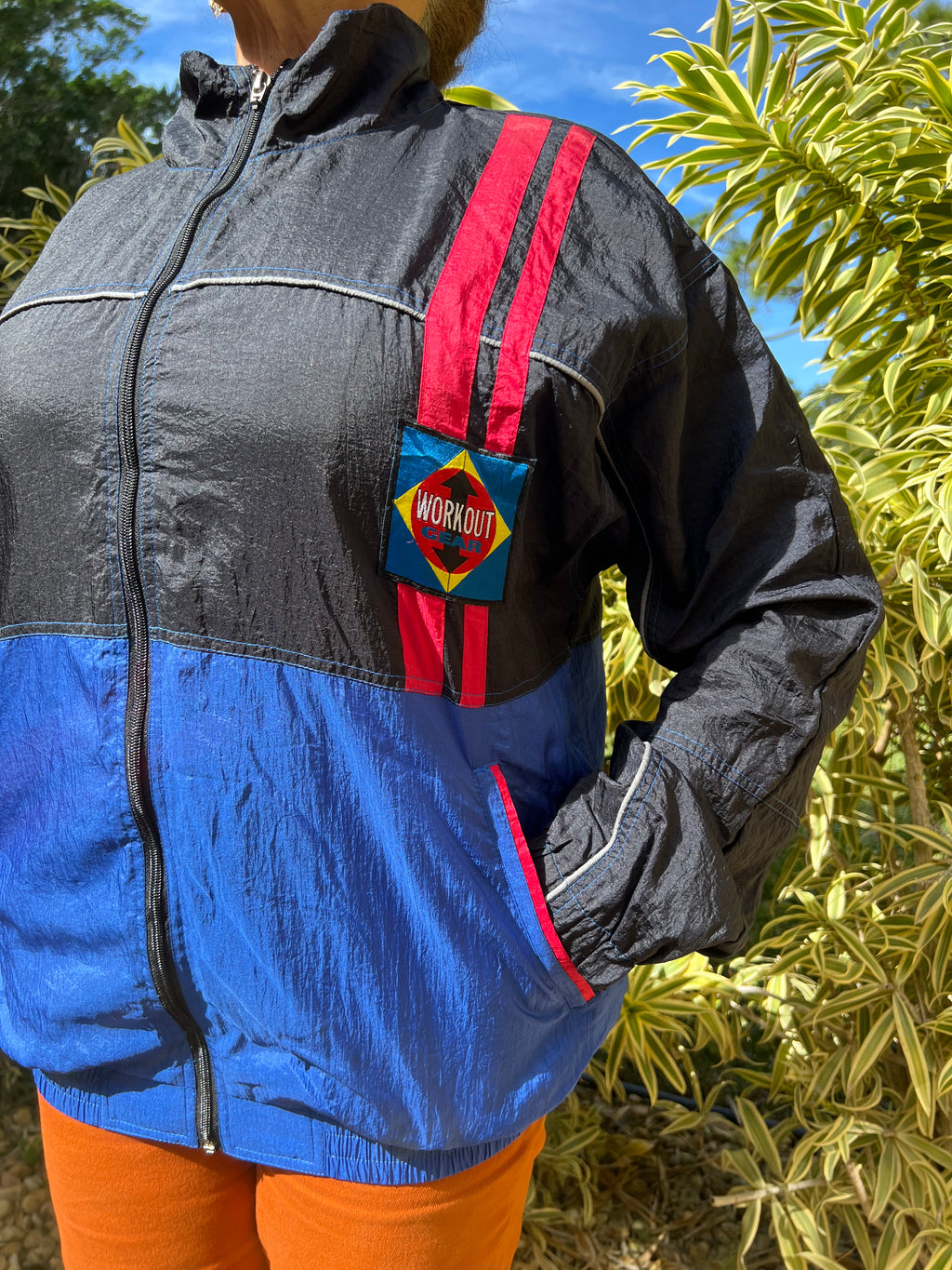 black and blue zip up trackie