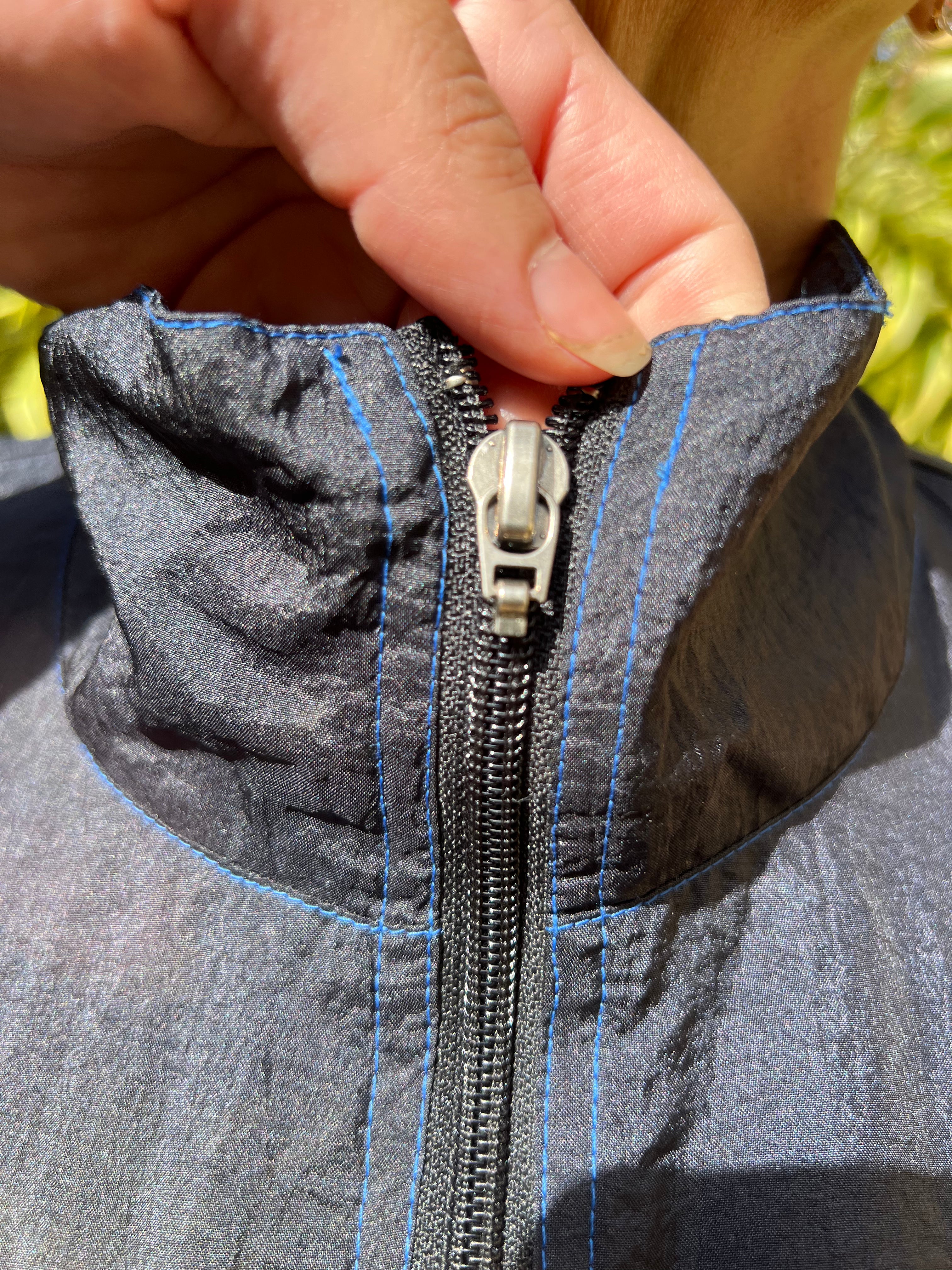 black and blue zip up trackie