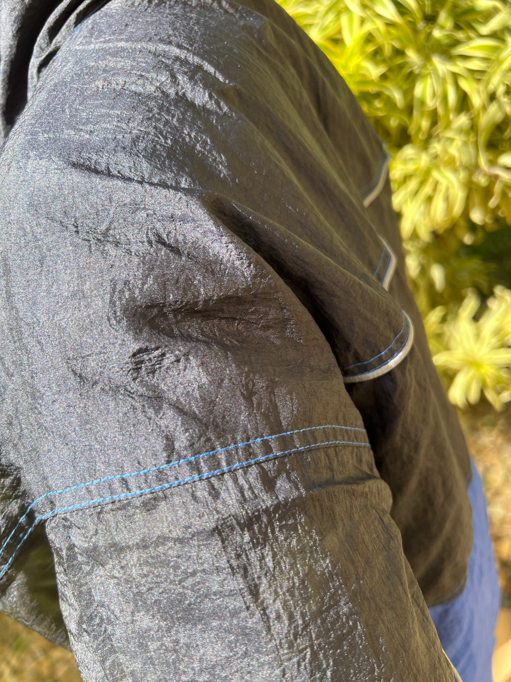 black and blue zip up trackie