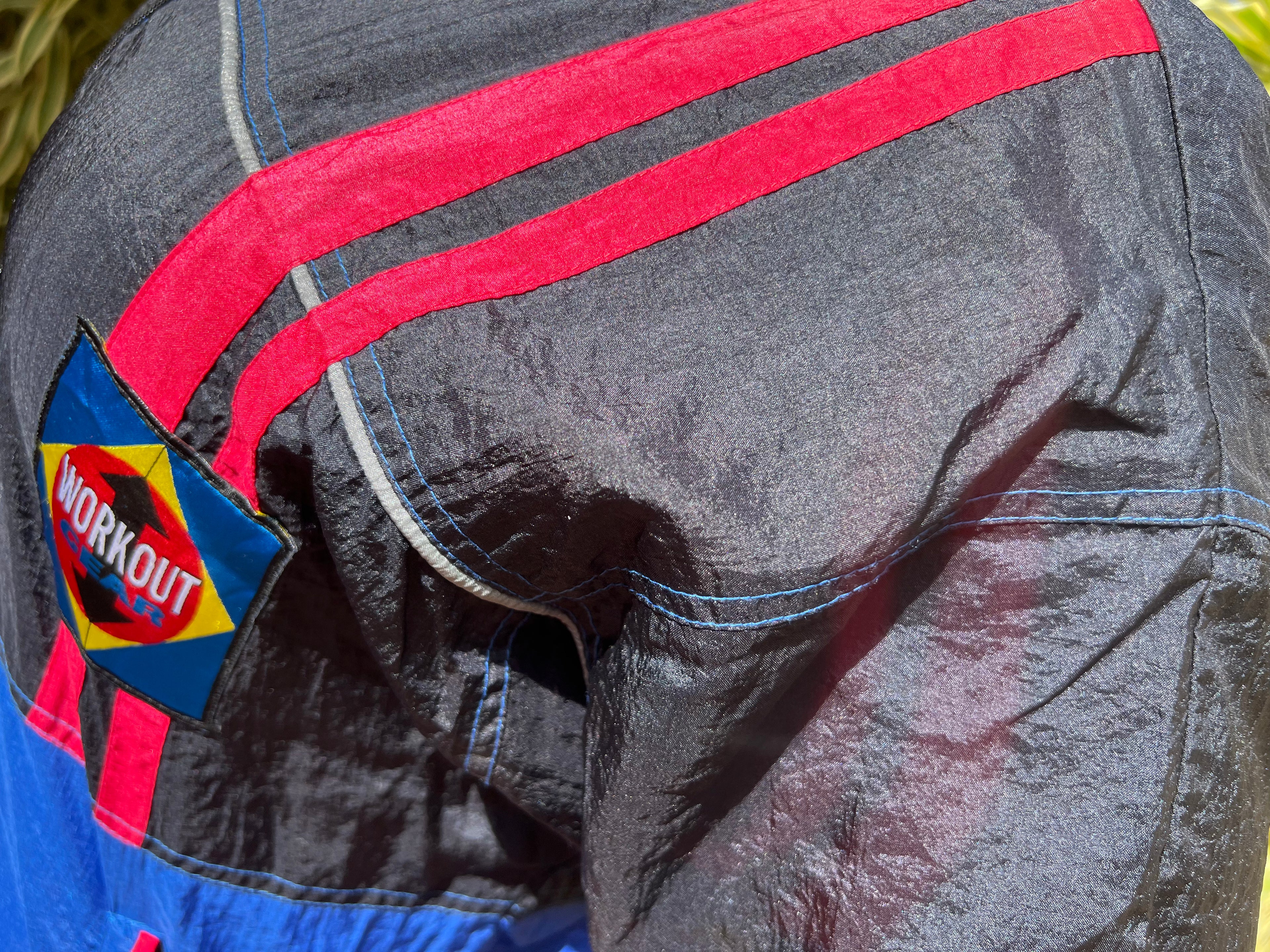 black and blue zip up trackie